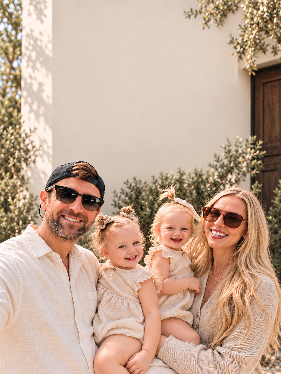 Ivan and Katie smiling with their two children